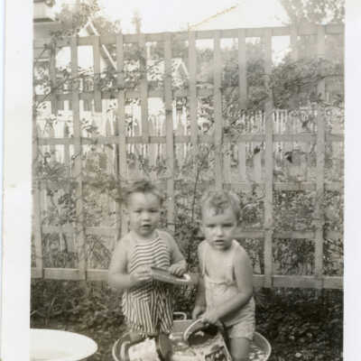 O'Neill children playing in a wash basin