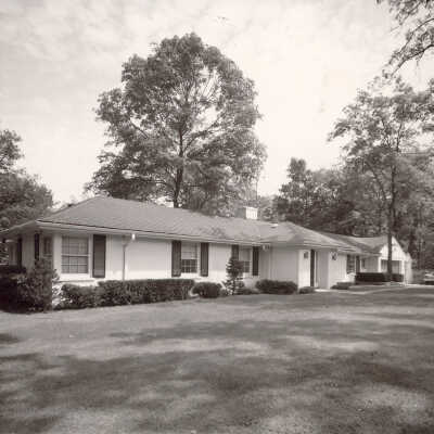 White ranch residence with center entrance