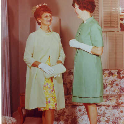 Mrs. Joseph Matulenas and Virginia Fiester modeling wedding attire