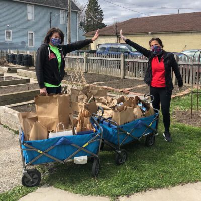"Gathering food for donations to neighbors in need"