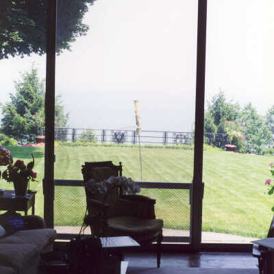 View of back lawn and Lake Michigan from porch of Edward Byron Smith house