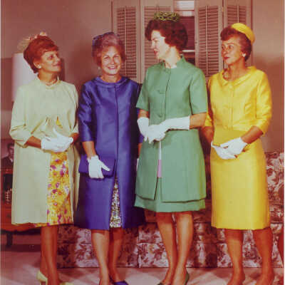 Four women modeling wedding attire