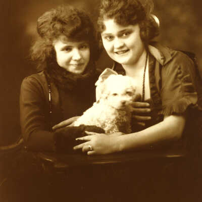 Unidentified girls with dog