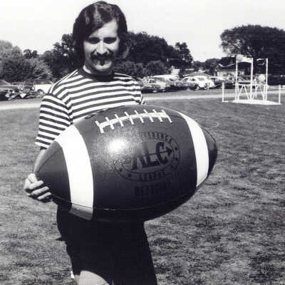 Person Holding Large Football