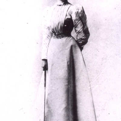 Rose Farwell with golf club