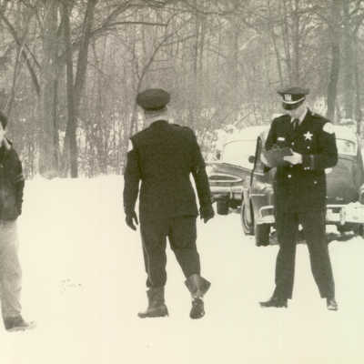 Two police officers in snow