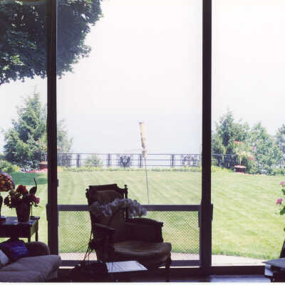 View of back lawn and Lake Michigan from porch of Edward Byron Smith house