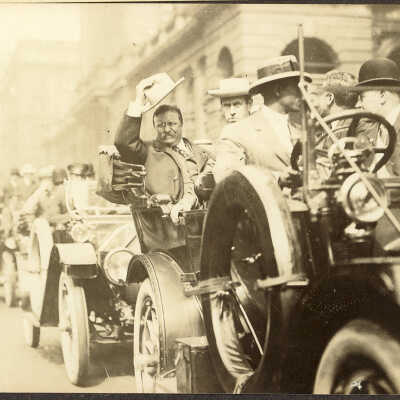 Theodore Roosevelt in a parade or motorcade