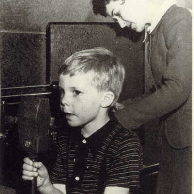 Kindergarten student with a microphone