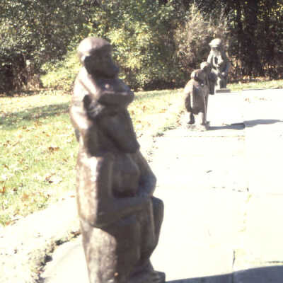 A row of sculptures in a garden