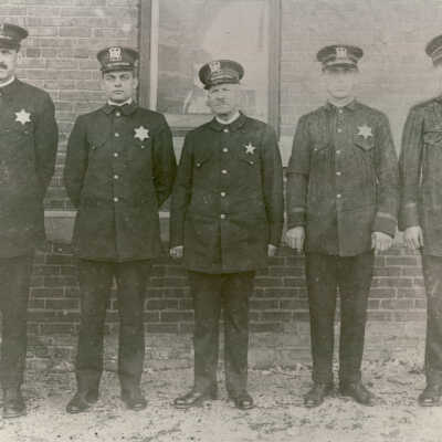 Five police officers in uniform