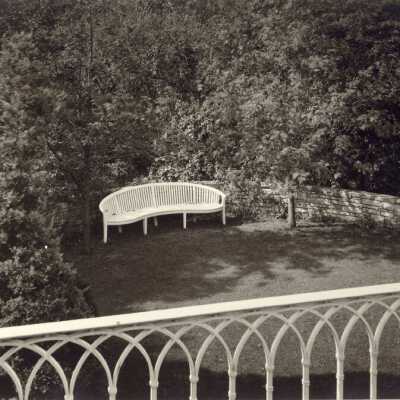Lawn with white bench