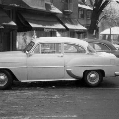 Car parked in Market Square in front of Garnett & Co.