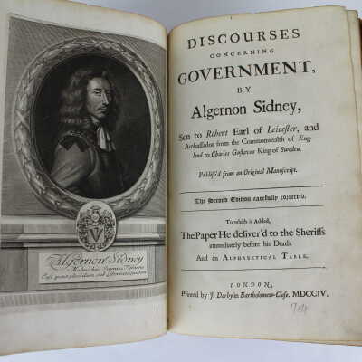 Full title page with illustration: In this image, the marbled interior cover is visible. This decorative element is unique to this work due to the process of marbling.