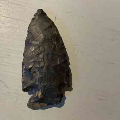 Intrusive Mound Corner Notch