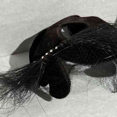 Black feather "fascinator" hat