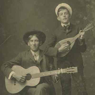 Ross Wood and another man Playing guitar