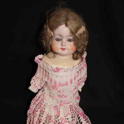 Dolly Largest doll with pink and white dress