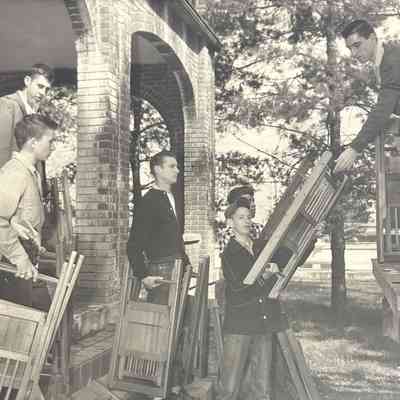 Carrying Chairs from McIntosh for $5 Banquet