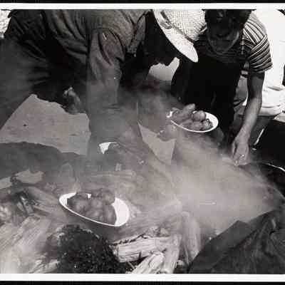 Siasconset clam bake. Now "the unveiling" (and he's hoping most guests have had a snifter, to allay their rising appetites).