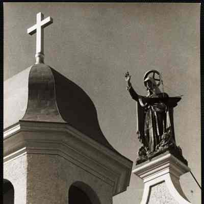 Madonna holding a fishing schooner in one hand - Church of Our Lady of Good Voyage Gloucester, Mass.