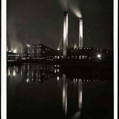 Great Northern Paper Company newsprint plant at night - Millinocket, Maine - this reflection is in the Penobscot River.