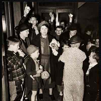 Halloween celebration. Mothers round up children at sta. 16.