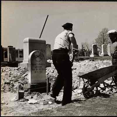 Placing the old stones in the new cemetery