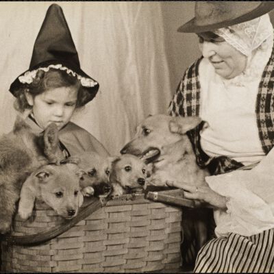 Miss Betty Place and Mrs. W.L. McCammon with Welsh corgis