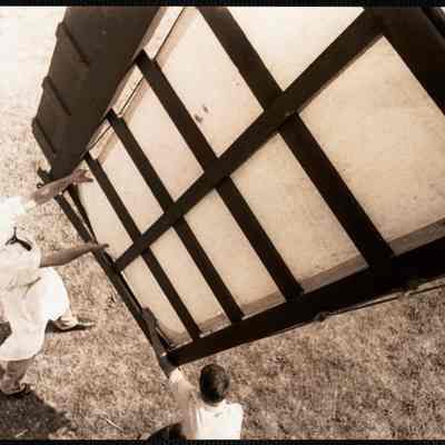 Nantucket. The old mill. Putting sails on the vanes-