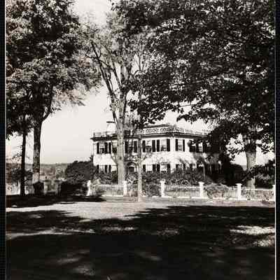 Royalston, Mass a square white house on a sleepy hill top common.