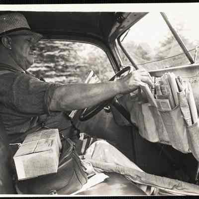Hanna doesn't even have to take his eyes off the road - just feels for the mail