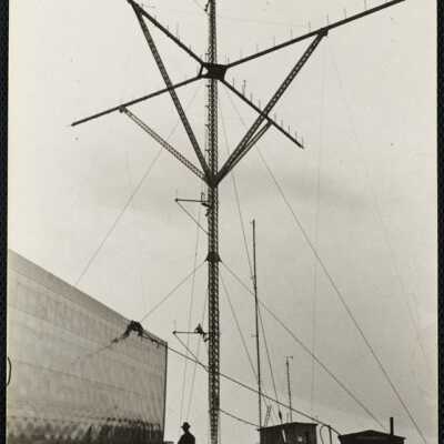 Blades and anemometer masts. If you look closely you will see the anemometers on the cross areas and trace where man is sitting, also above him.