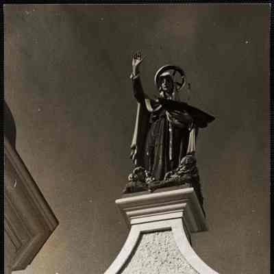 Madonna holding a fishing schooner in one hand - Church of Our Lady of Good Voyage Gloucester, Mass.