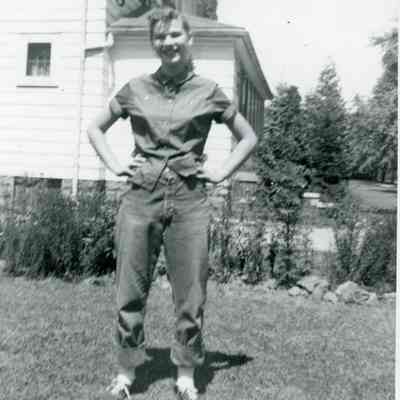 Judy Lanczki in front of Pat Millar's house.
