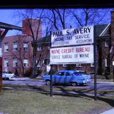 Paul S. Avery Income Tax Service Sign. Nankin Hospital in background.