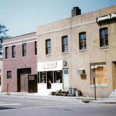 Side of buildings down Biddle. West side.