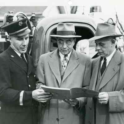 Fire Chief Goudy, John Mclaughtlyn of Bell Tele Co. & Police Chief Knox