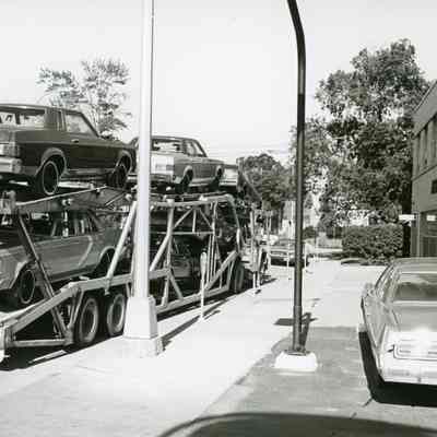 Car hauler in front of 35540 Michigan