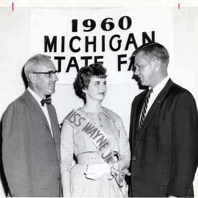 1960 Miss Wayne Jaycee Joan White with General Manager Donald Swanson and Lt. Gov. John B Swainson at the 1960 Michigan State Fair