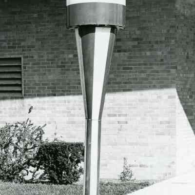 United Foundation torch in front of library on Wayne Rd.