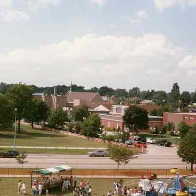 Looking West, carnival on corner. 1988