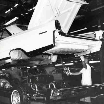 Chassis being lowered onto frame in Wayne Assembly Plant.