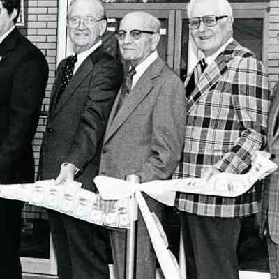 Tom Daily,City Manager, Jim Glennie, Lawrence Wyand and Miles Dietrich at a grand opening of a bank. Picture taken by Lothar.E Konietzko.