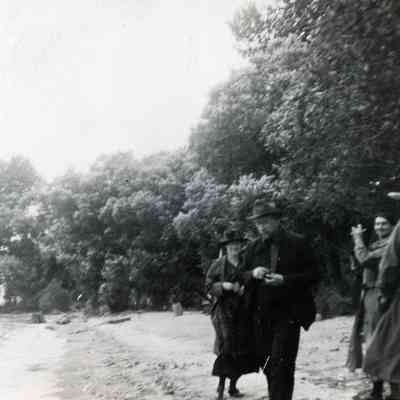 People by the trees.