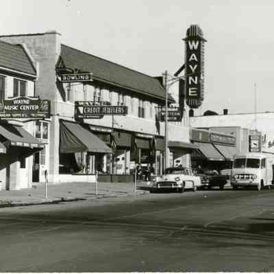 Early 1950s. Gem Cleaners, Wayne Music Center, Bowling, Wayne Credit Jewlers, Western Union, Wayne Theater.