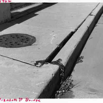 Elizabeth St. Bridge West side curb