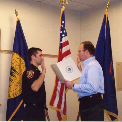 Firefighter being sworn in by City of Wayne Clerk