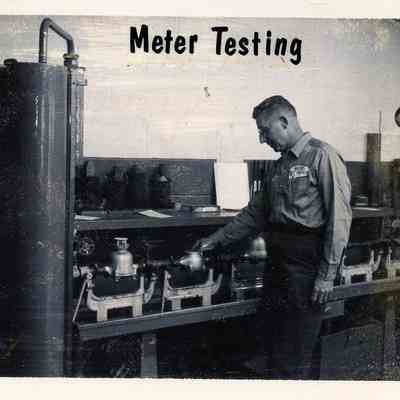 D.P.W worker testing meters.