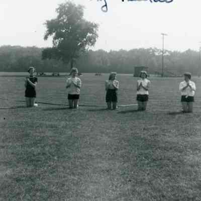 Judy Lanczki, Barb D'Polus, Marilyn Johnson, Alice Neddrie and Patti Bingel at Cheer Practice of August in 1954.